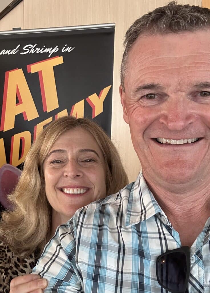 Mark and Alyson with a Rat Academy Poster